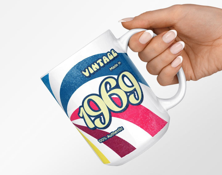 Custom Birth Year 1960's Retro Vintage Coffee Mug being held by hand