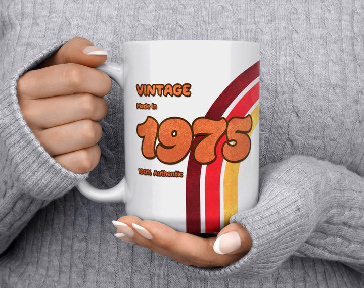 Custom Birth Year 1970's Retro Vintage Coffee Mug being held by woman in grey sweater